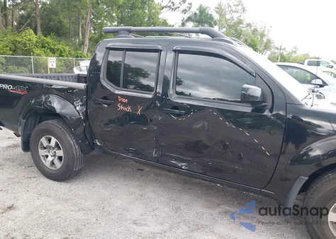 2011 Nissan Frontier Pro-4X из США, поврежденный, VIN 1N6AD0EV1BC413296